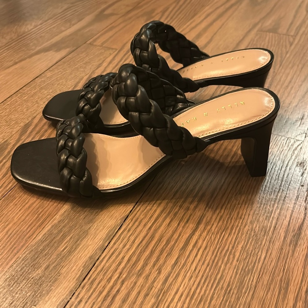 A sandal heel in mint condition in black